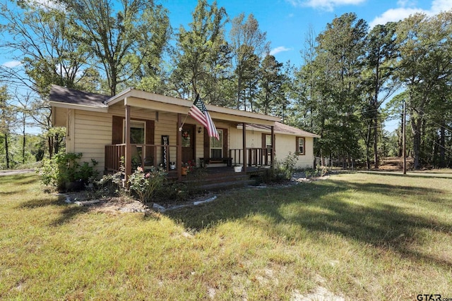 ranch-style house featuring a front lawn