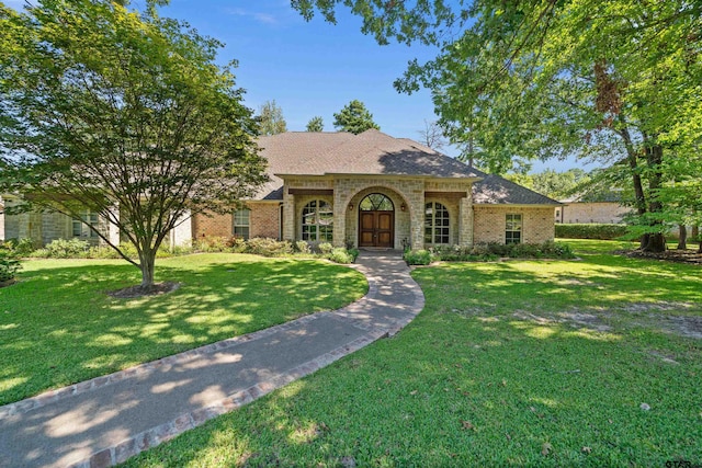 view of front of house with a front lawn