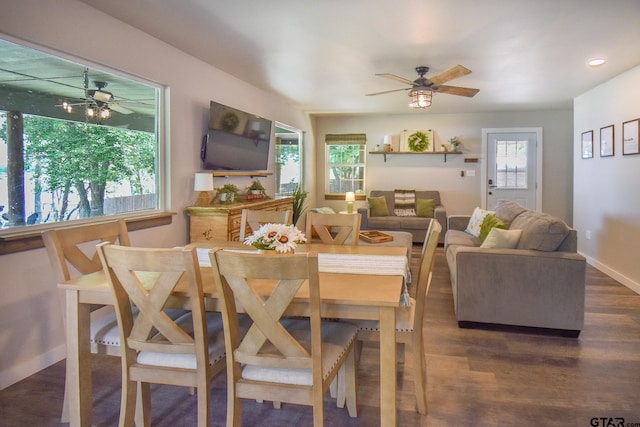 21171 Sand Jack Rd, Larue, TX 75770 - dining room with a ceiling fan, dark wood-style flooring, and baseboards