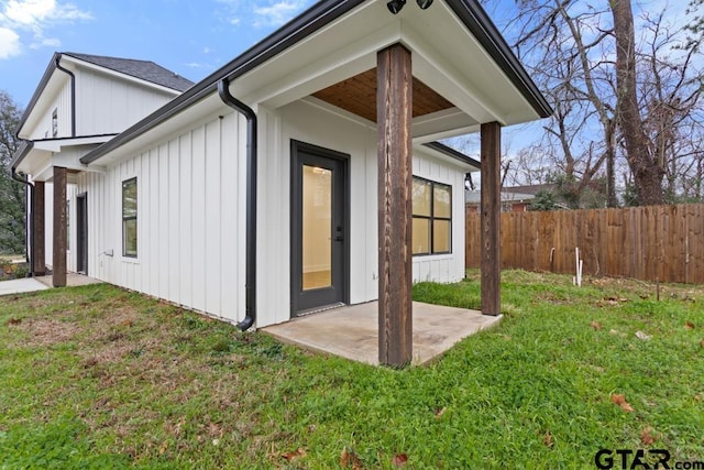 exterior space featuring a yard and a patio area