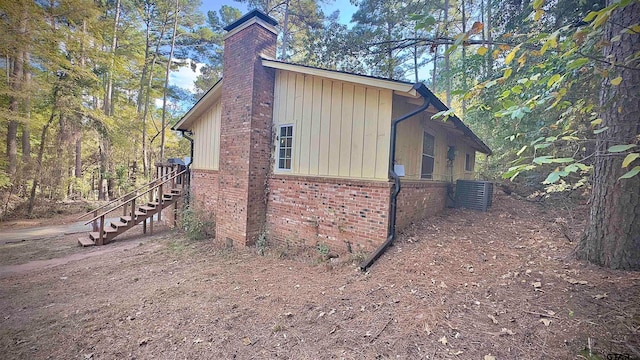 view of home's exterior with central AC unit