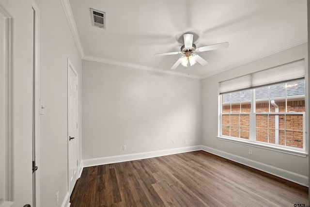 unfurnished room featuring hardwood / wood-style floors, ceiling fan, and crown molding