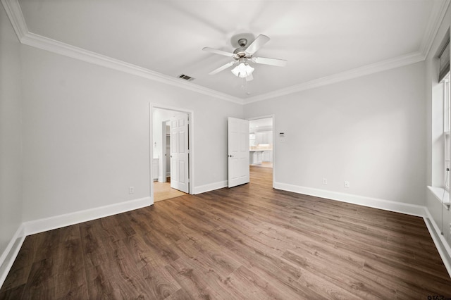 unfurnished bedroom featuring hardwood / wood-style floors, ceiling fan, and crown molding