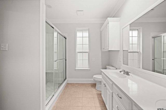 bathroom featuring tile patterned flooring, vanity, walk in shower, and ornamental molding