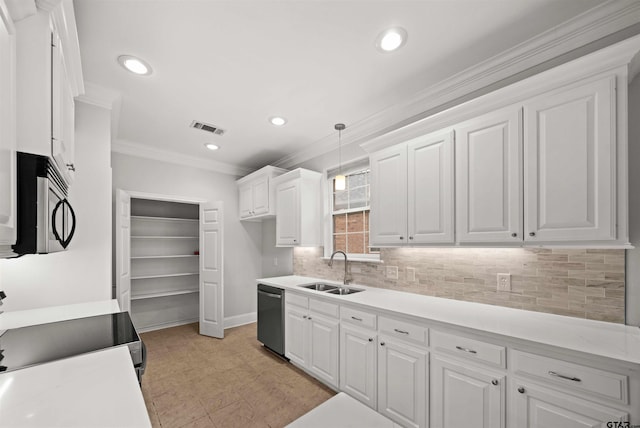 kitchen with white cabinetry, pendant lighting, stainless steel appliances, and sink