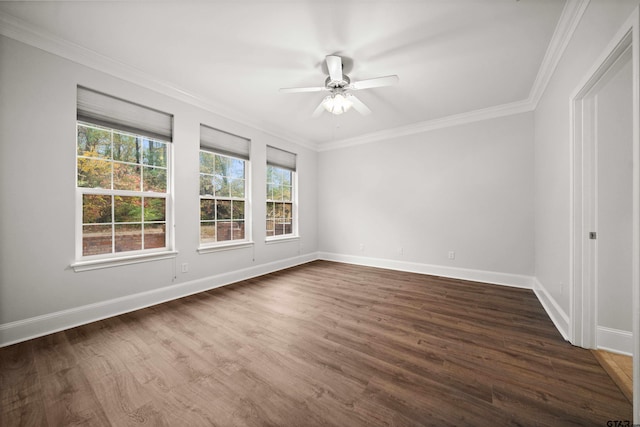 spare room featuring crown molding, ceiling fan, and dark hardwood / wood-style floors