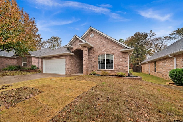 view of front facade with central AC unit, a garage, and a front lawn