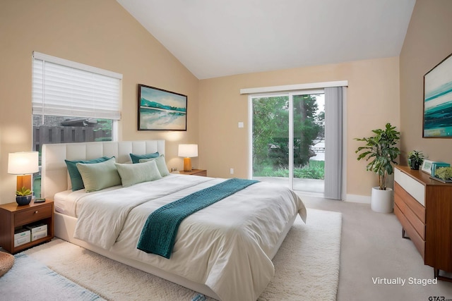 bedroom featuring baseboards, access to exterior, light colored carpet, and vaulted ceiling