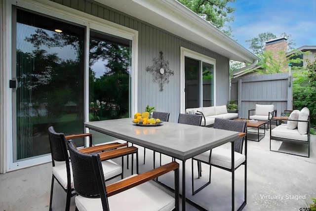 view of patio / terrace with fence and outdoor lounge area