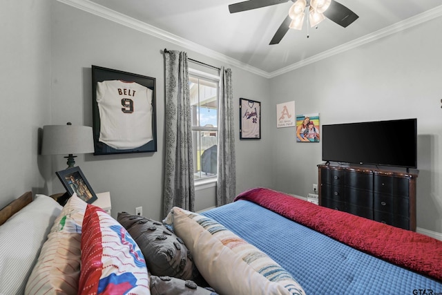 bedroom with ornamental molding and ceiling fan