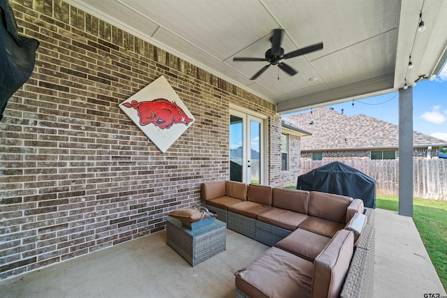 view of patio / terrace with an outdoor living space, a grill, and ceiling fan