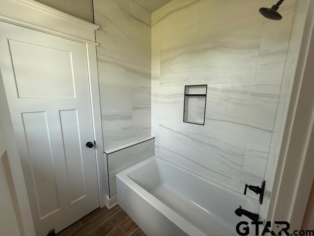 14533 Woodland Creek Dr, Tyler, TX 75706 - full bathroom featuring wood finished floors and shower / bathtub combination