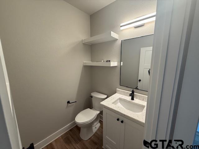 14533 Woodland Creek Dr, Tyler, TX 75706 - bathroom with wood finished floors and vanity