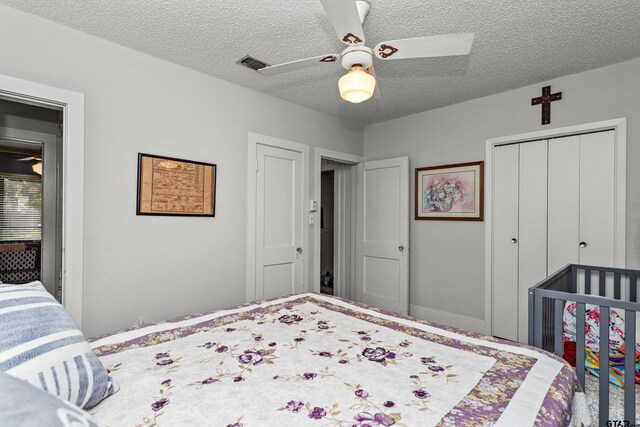 552 W State Highway 7, Crockett, TX 75835 - bedroom featuring a textured ceiling, a closet, and ceiling fan