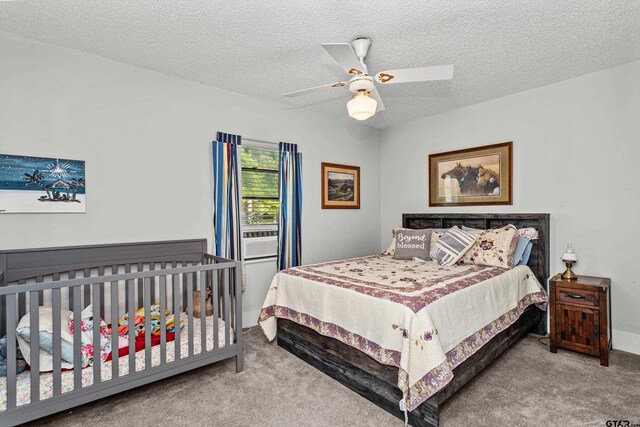 552 W State Highway 7, Crockett, TX 75835 - carpeted bedroom with a textured ceiling and a ceiling fan