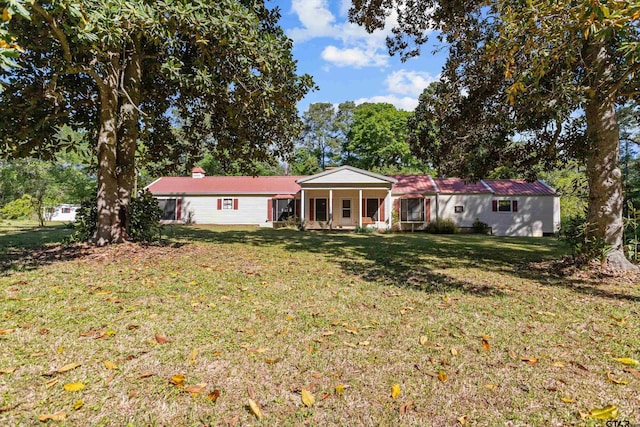 552 W State Highway 7, Crockett, TX 75835 - back of house featuring a yard