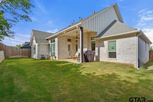 4188 Palo Pinto Creek Cir, Tyler, TX 75703 - back of house featuring ceiling fan, brick siding, a fenced backyard, and roof with shingles