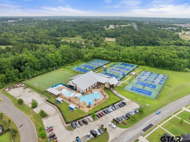 4188 Palo Pinto Creek Cir, Tyler, TX 75703 - drone / aerial view of a heavily wooded area and a pool area