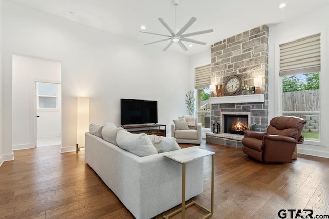 4188 Palo Pinto Creek Cir, Tyler, TX 75703 - living room with a ceiling fan, a fireplace, plenty of natural light, and recessed lighting
