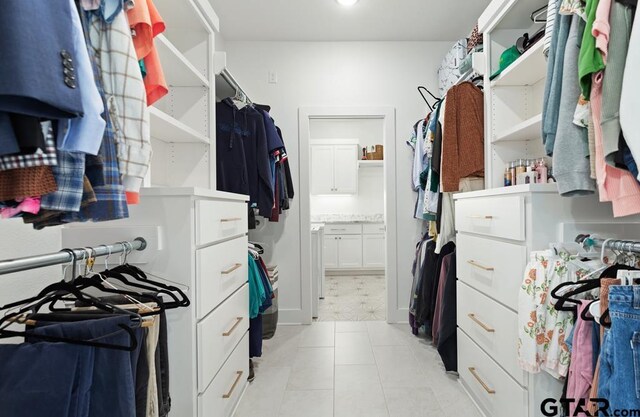 4188 Palo Pinto Creek Cir, Tyler, TX 75703 - spacious closet featuring light tile patterned floors