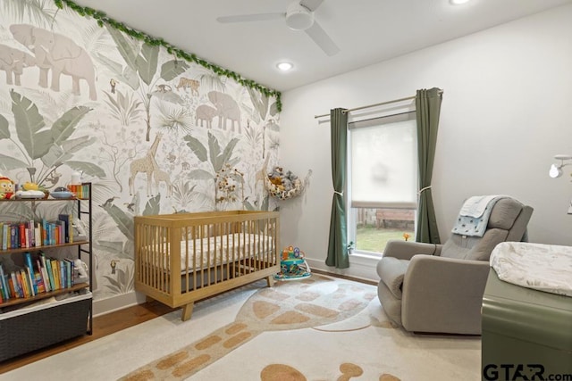 4188 Palo Pinto Creek Cir, Tyler, TX 75703 - bedroom with wood finished floors, recessed lighting, a ceiling fan, and a nursery area