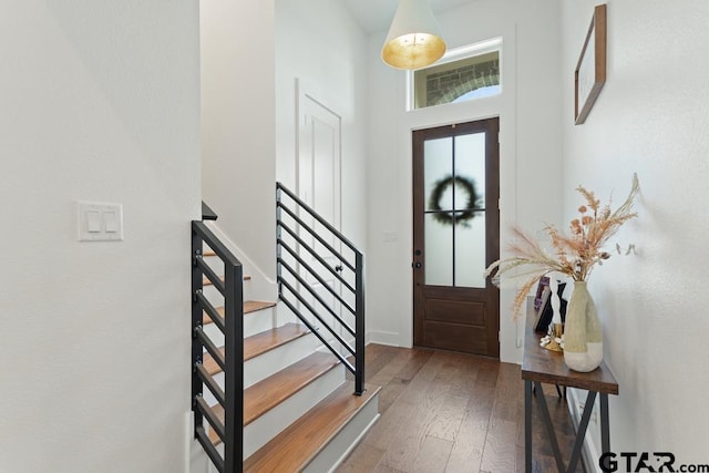 4188 Palo Pinto Creek Cir, Tyler, TX 75703 - foyer entrance with a high ceiling, stairway, and hardwood / wood-style floors