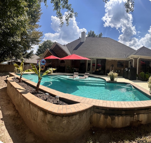 view of pool with a patio area