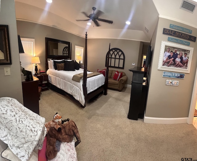 bedroom with light colored carpet, ceiling fan, and vaulted ceiling