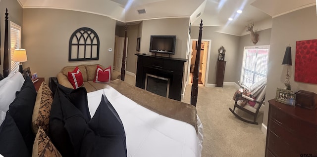 carpeted bedroom featuring vaulted ceiling