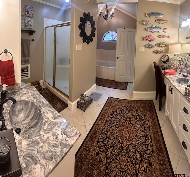 bathroom with tile patterned flooring, vanity, crown molding, and a shower with shower door