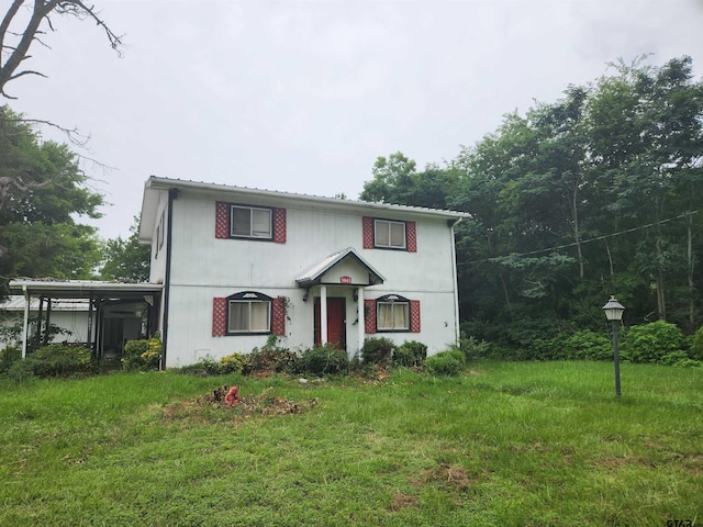 view of front facade featuring a front yard