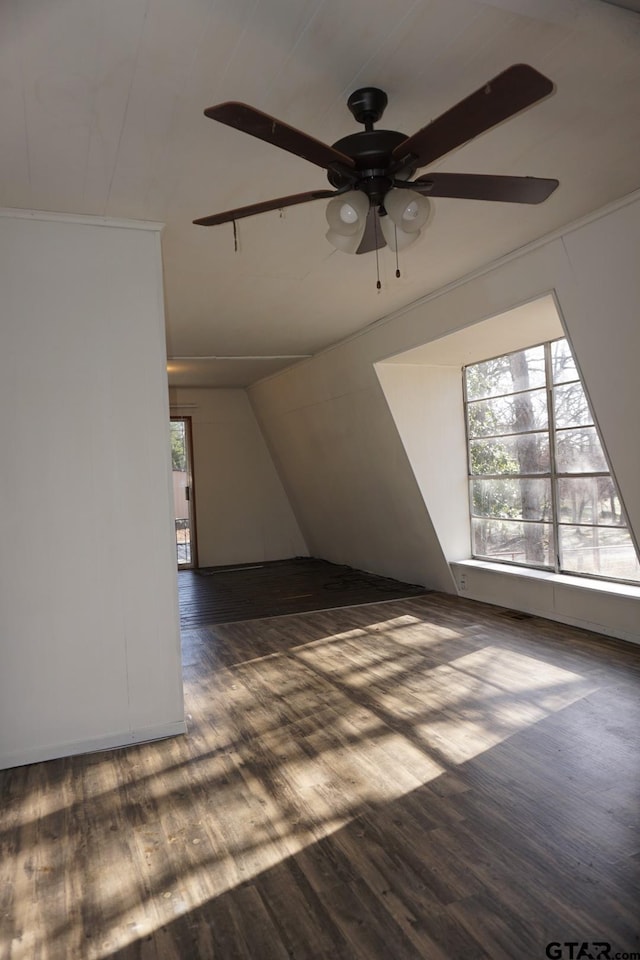 6385 Wagon Tree Trl, Athens, TX 75751 - additional living space featuring a ceiling fan, lofted ceiling, and dark wood finished floors