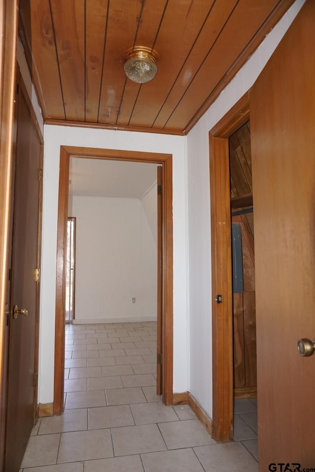 6385 Wagon Tree Trl, Athens, TX 75751 - hallway featuring light tile patterned floors, wood ceiling, and ornamental molding