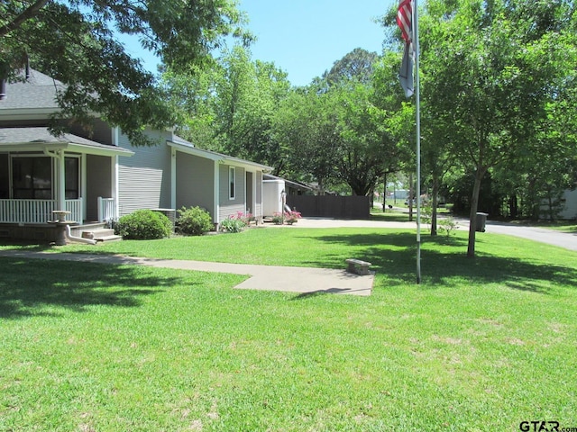 view of yard featuring a porch