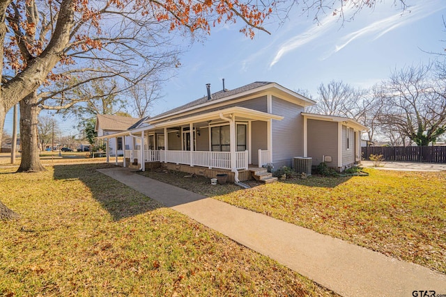 view of front of home featuring a front yard and covered porch