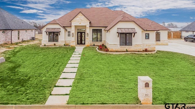 exterior space featuring cooling unit and a lawn