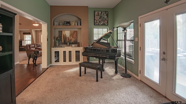 misc room with french doors and carpet floors