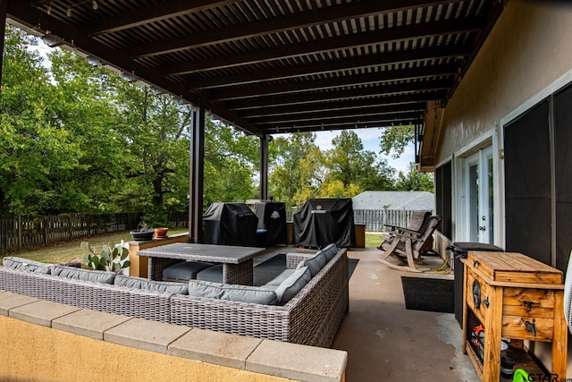 view of patio / terrace featuring an outdoor living space and a grill