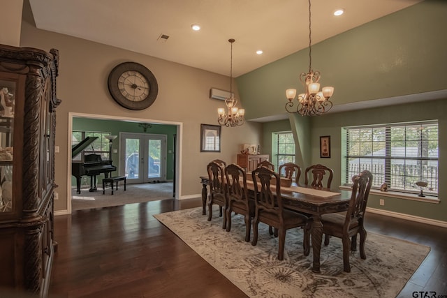 dining room with a chandelier, french doors, dark hardwood / wood-style flooring, and high vaulted ceiling