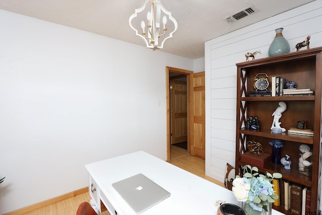 306 Lake Dr, Mount Vernon, TX 75457 - office with light wood-type flooring, a chandelier, and baseboards