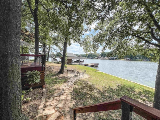 306 Lake Dr, Mount Vernon, TX 75457 - view of yard with a water view and a dock