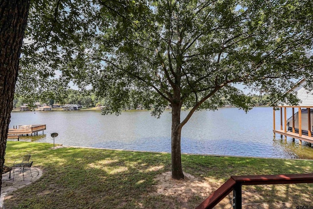306 Lake Dr, Mount Vernon, TX 75457 - dock with a water view and a lawn