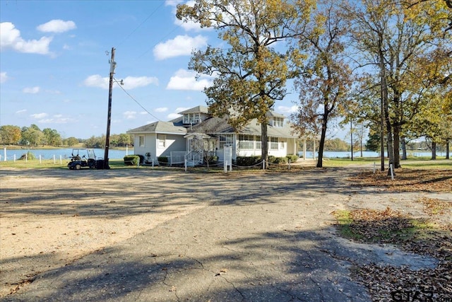 view of front of home featuring a water view