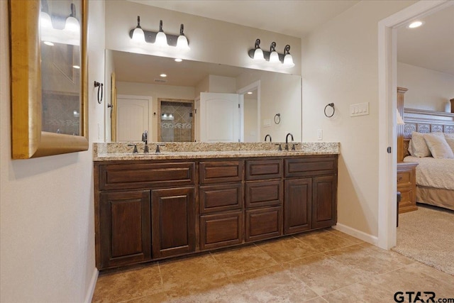 bathroom featuring vanity and tile patterned floors