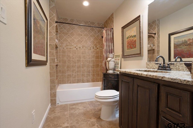 full bathroom featuring toilet, vanity, tiled shower / bath combo, and tile patterned flooring