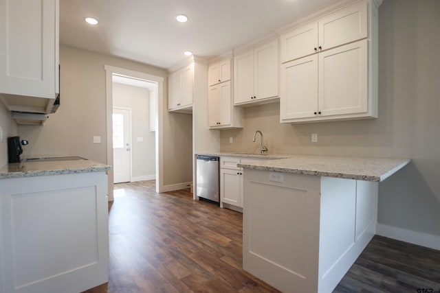 kitchen with dark wood-style flooring, a peninsula, white cabinetry, stainless steel dishwasher, and a sink