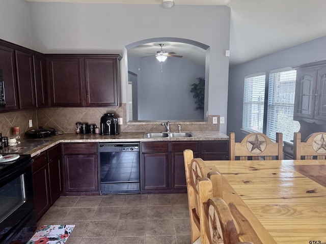 kitchen featuring tasteful backsplash, dark brown cabinets, sink, and black appliances