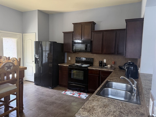 kitchen with sink, light tile patterned floors, backsplash, dark brown cabinets, and black appliances