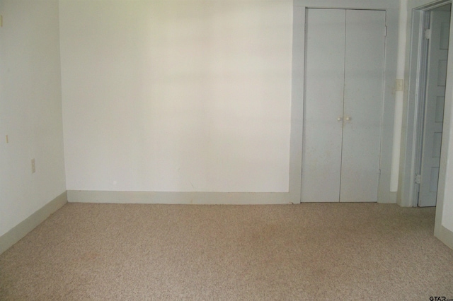 411 N College St, Lindale, TX 75771 - empty room featuring carpet floors