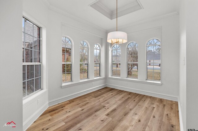 6309 Gleneagles, Tyler, TX 75703 - unfurnished dining area with baseboards, a notable chandelier, crown molding, and hardwood / wood-style flooring